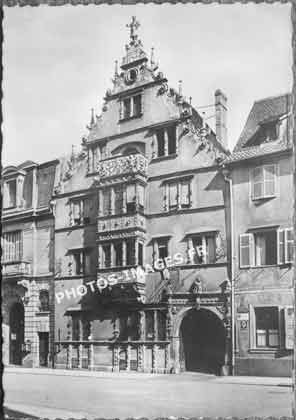 Photo ancienne de la Maisons des Têtes en carte postale ancienne  de 1932