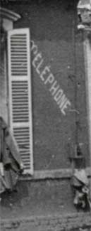 Photo de l'inscription Téléphone en 14-18 sur le mur de l'ancien café qui a changé de propriétaire à Ham ww1